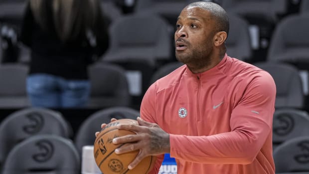 Clippers veteran P.J. Tucker shoots a ball in warmups before a game.